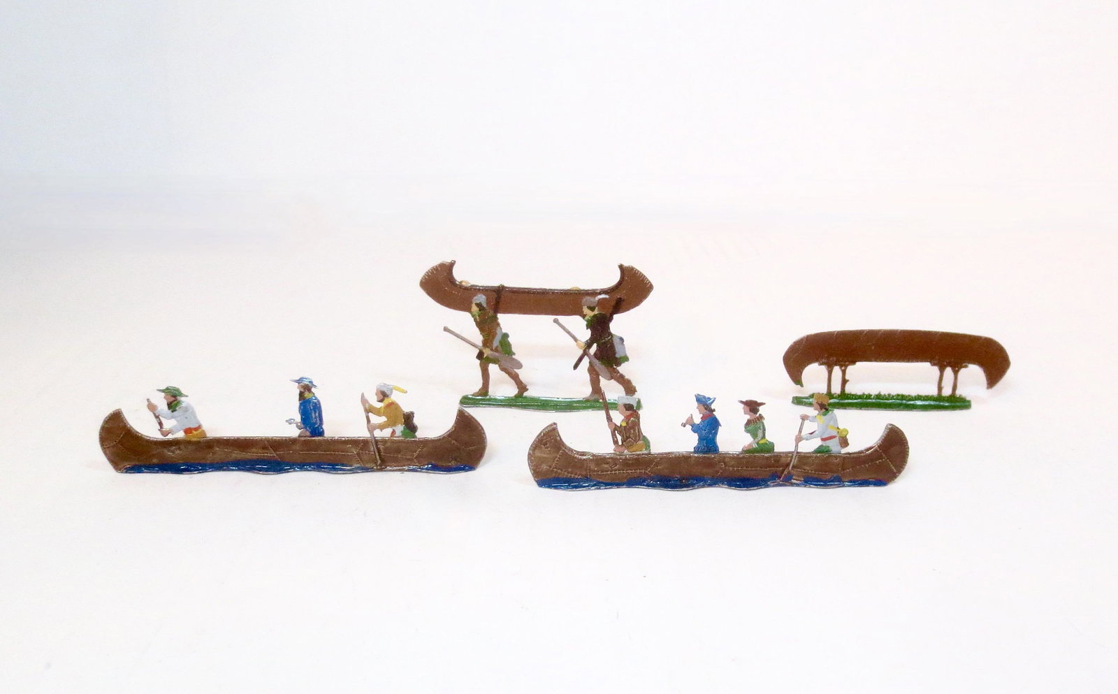 Lewis & Clarke Expedition Tin Flats: Finely detailed set depicting the famed "Corps of Discovery". Pieces measure 3" to 4" long. Unboxed.