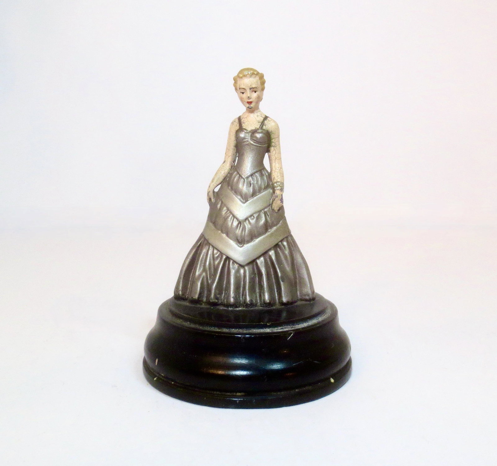 Grace Kelly Lead Figurine: Movie star and Princess of Monaco. Measures 4.75" on wooden base. Unboxed.