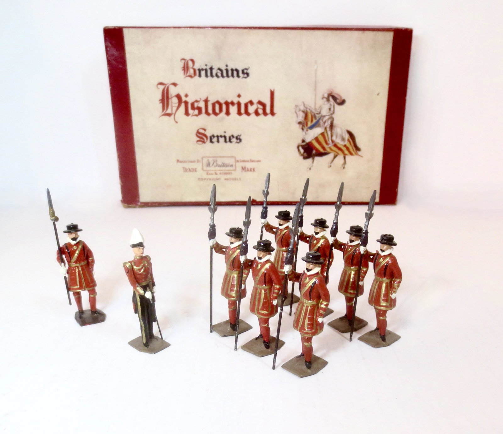Britains #1257 The Yeomen of The Guard: Post war issue. 9 pieces. Near mint to excellent condition (one mismatched Yeoman). Box very good (one top corner split).