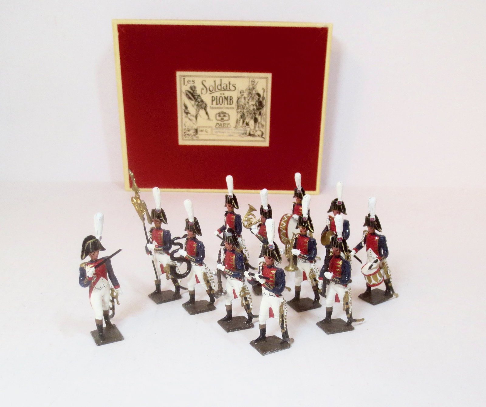 Mignot Musique Garde D'Honneur: Post war issue. Imperiale De Strasbourg 1805. 12 pieces. Near mint to excellent (one broken plume, included for repair). Box excellent.