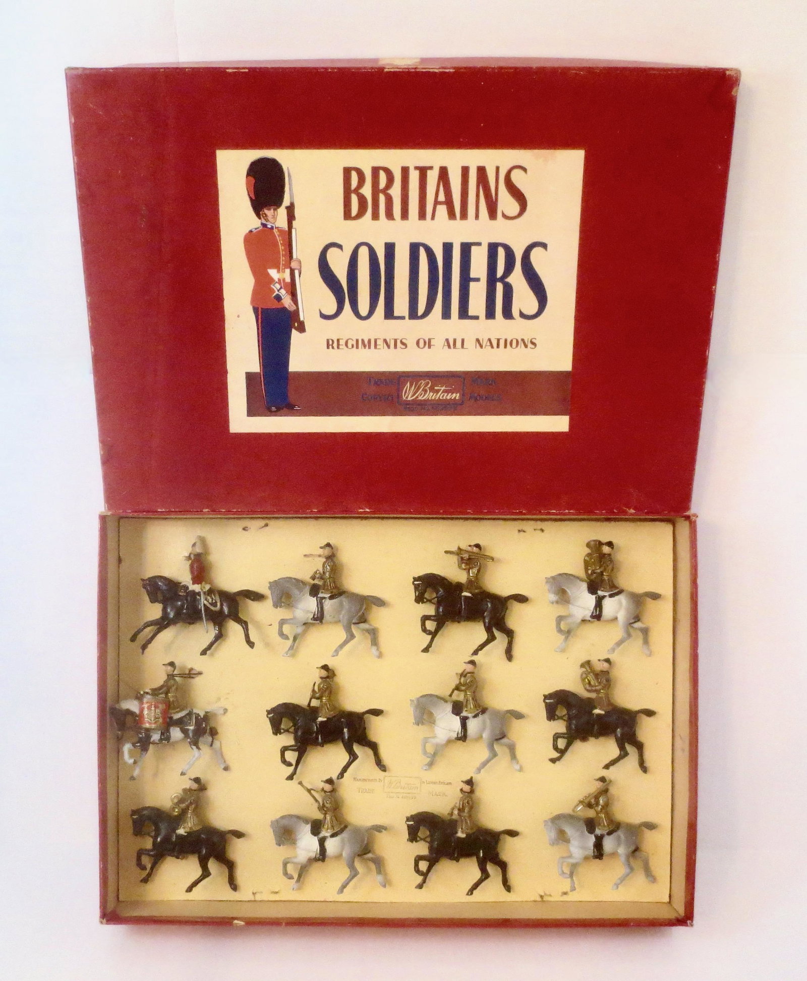 Britains #101 Band of The Life Guards: Post war issue. 12 pieces. Near mint condition, retied to card in ROAN label box. Box very good (side label damaged)
