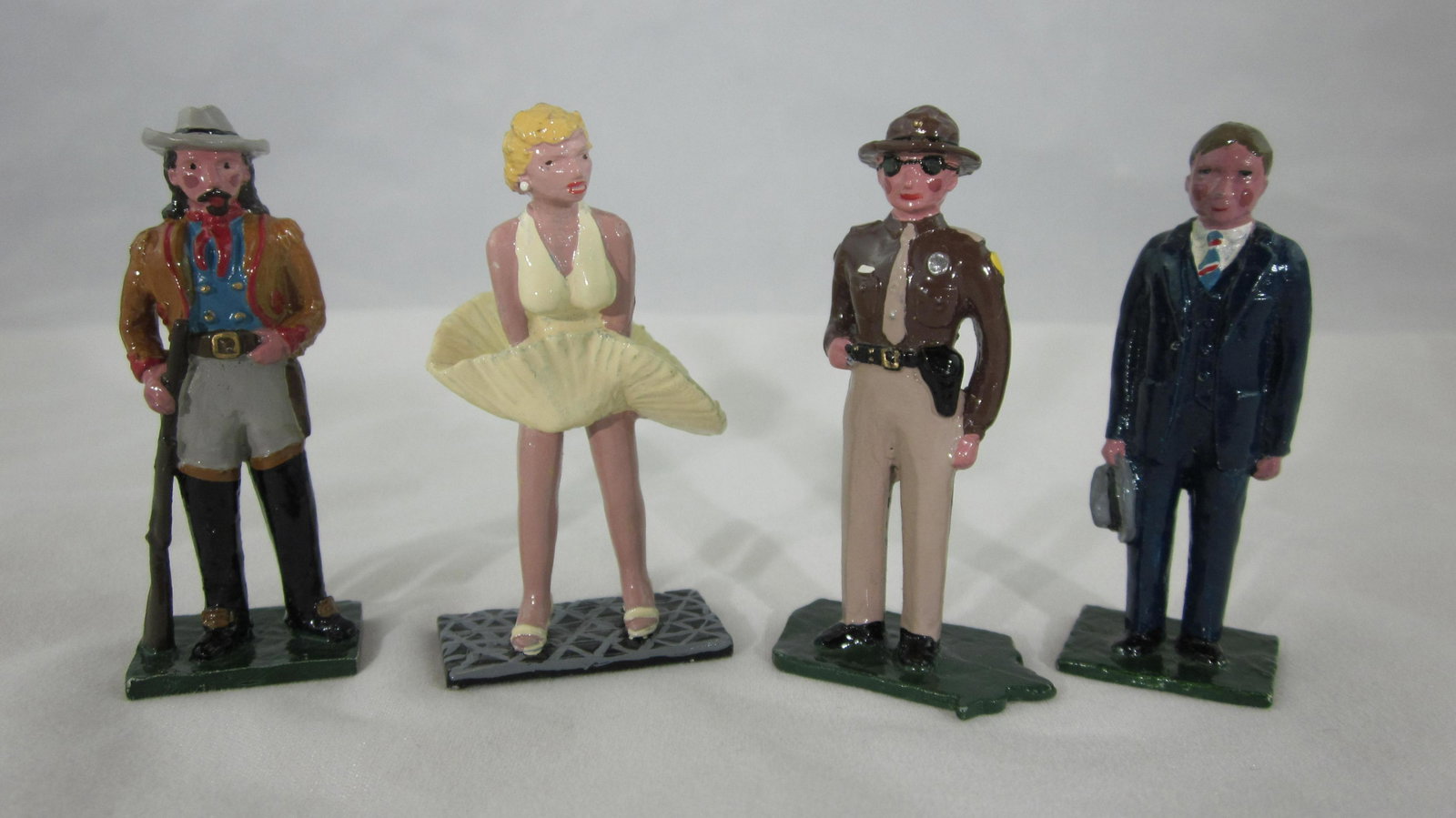 Blenheim Models Famous Iowan Personalities.: UNBOXED limited production circa 1979 of famous Iowan Personalities. 4 pieces including Herbert Hoover, State Trooper, Buffalo Bill Cody and Marilyn Monroe (Latter done not because she was from Iowa, 