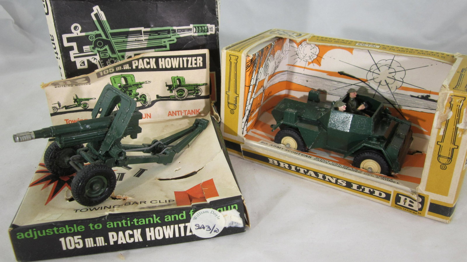 Britains 8th Army Scout Car And 105mm Pak Gun.: Boxed #9784 Scout Car with RECAST CREW, and #9724 Pak Gun, both very good condition and both in good boxes, scuffed edges and small tears to side flaps. 4 pieces circa 1970.