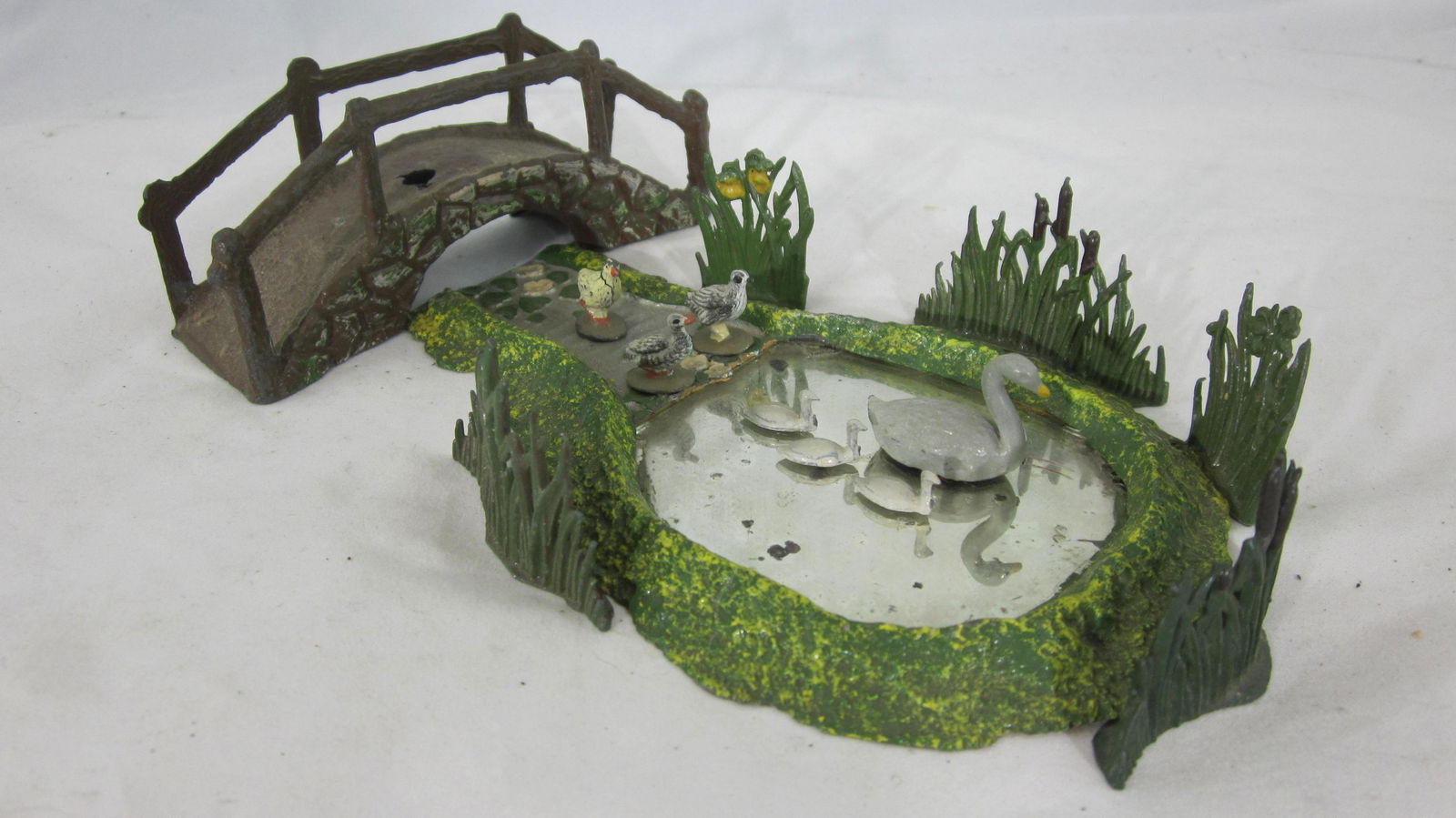 Johillco Pond, Swan, Cygnets And Taylor Bridge. (1 of 1)