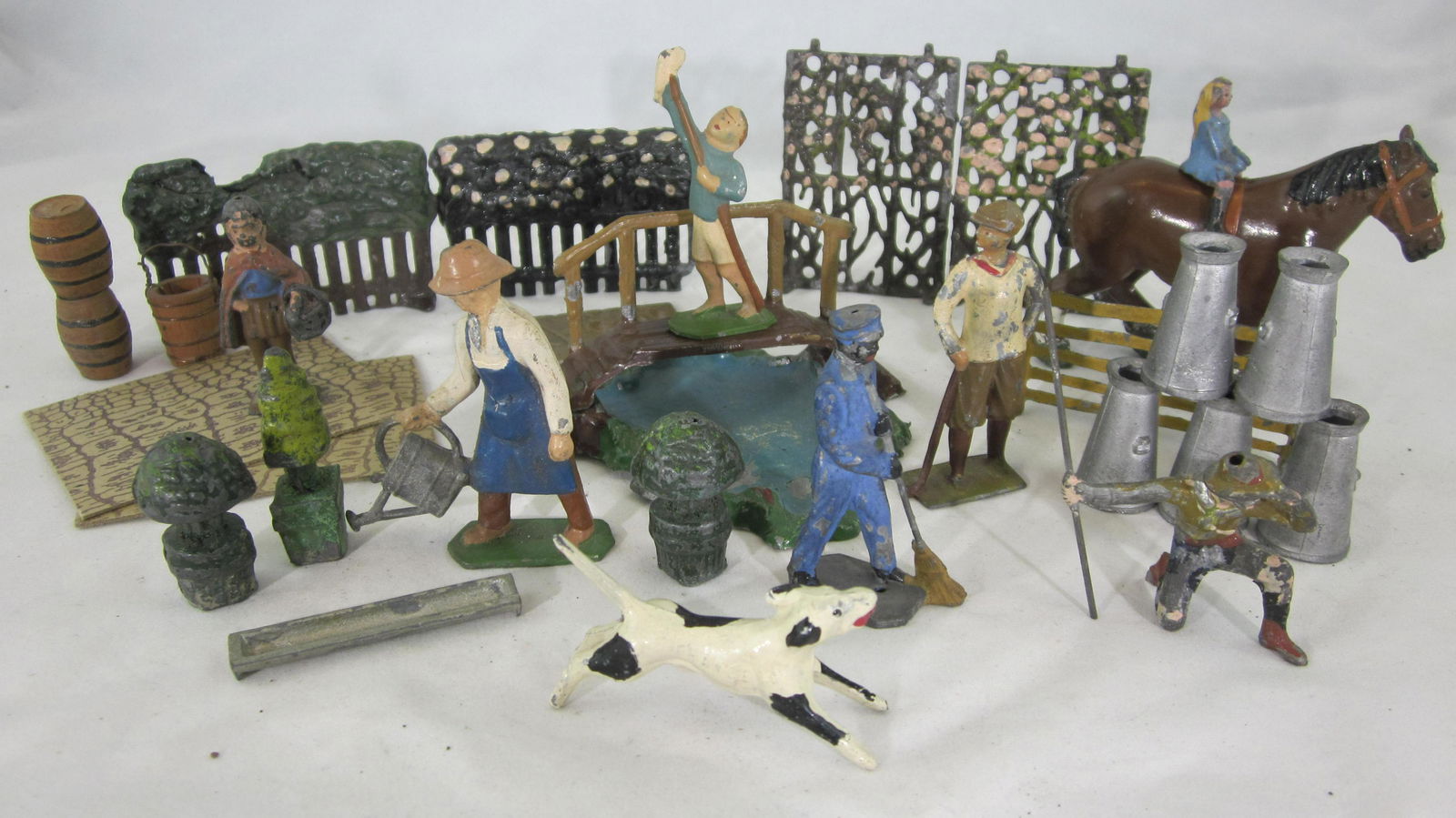 Kew, Fry, Britains, Johillco And French Medley.: UNBOXED French small Pond with Footbridge, unknown maker Red Riding Hood, Johillco Girl to ride Shire horse, Fry Boy Scout and many more. 28 pieces, condition very good-excellent. No box.