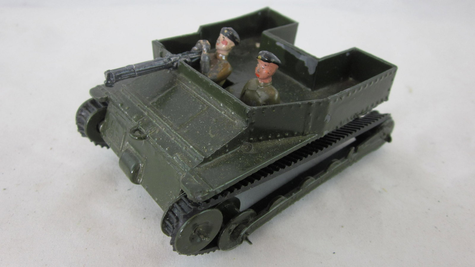 Britains Set #1203 Carden Loyd Tank.: UNBOXED Carden Loyd Tank with crew and machine gun. 1st version square rear end with replaced rubber tracks. 3 pieces, unusual dark green color, circa 1930s. Only offered . Condition excellent. No box