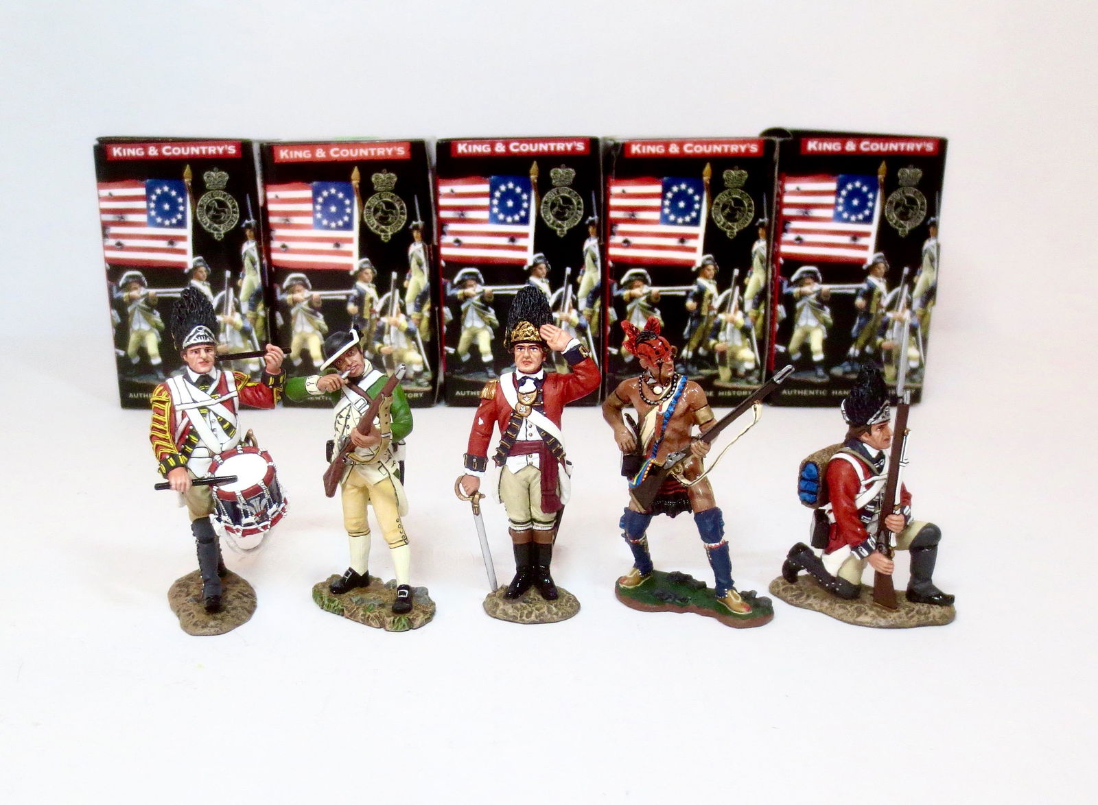 King & Country "American Revolution Series": Single figure assortment including; #AR046, #BR043, #BR046, #BR076, and #BR083. 5 pieces. Mint condition. Boxes excellent.