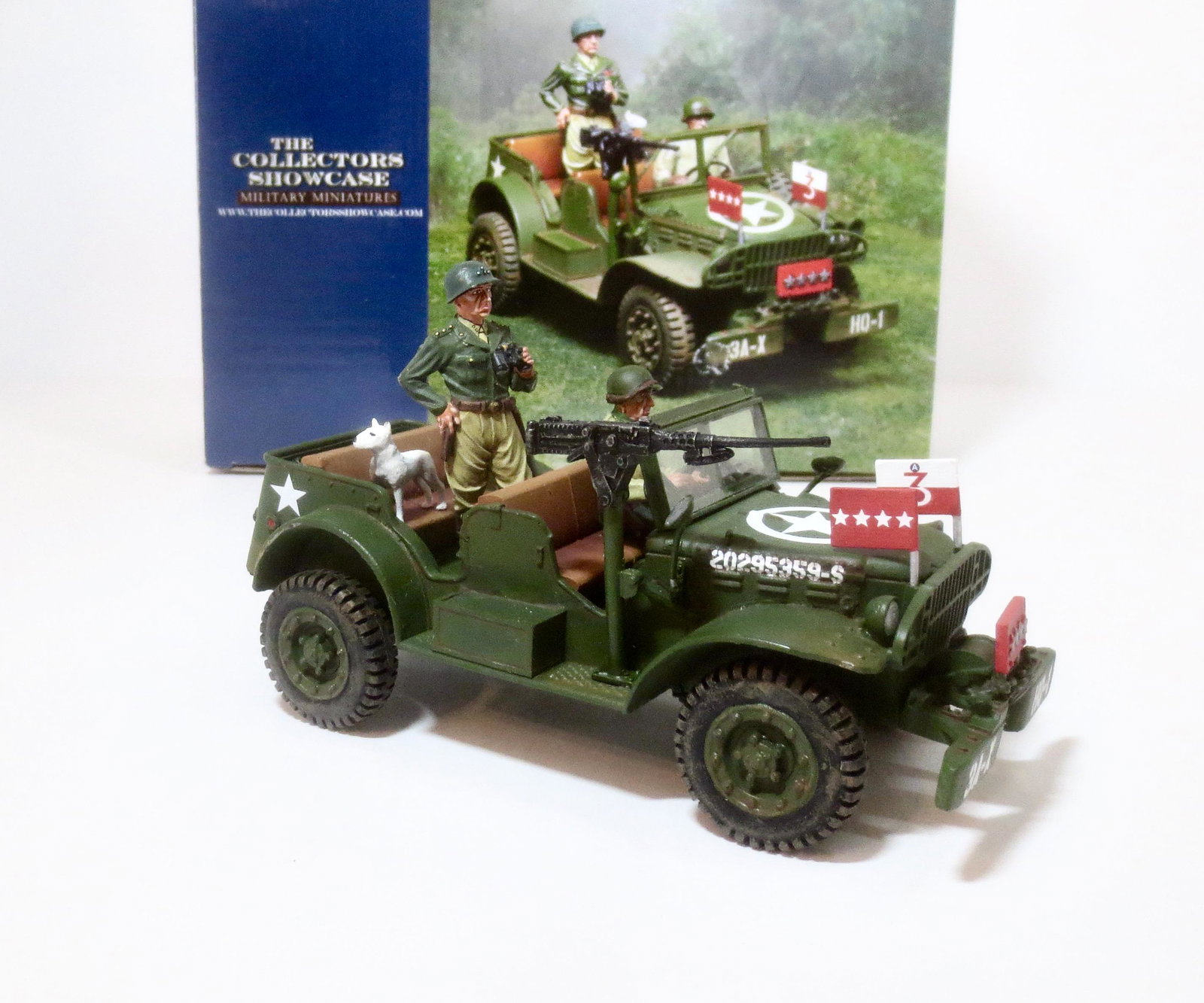 Collectors Showcase #CS00914 Patton Dodge WC57: Patton was fond of being a hands on commander. The Dodge WC57 was built tough to handle the most brutal terrain. This model comes complete with driver, Patton, and his dog Willy. 1/30th scale. Near mi