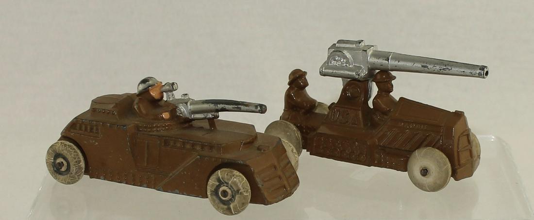 Manoil Lot Armored Car with Anti-Tank Gun: Lot includes Manoil #74 Armored Car with Anti-Tank Gun and Manoil #75 Armored Car with Anti-Tank Gun. White Rubber Tires on Both Vehicles. 2 Pieces. Condition Good to Very Good. No Box.