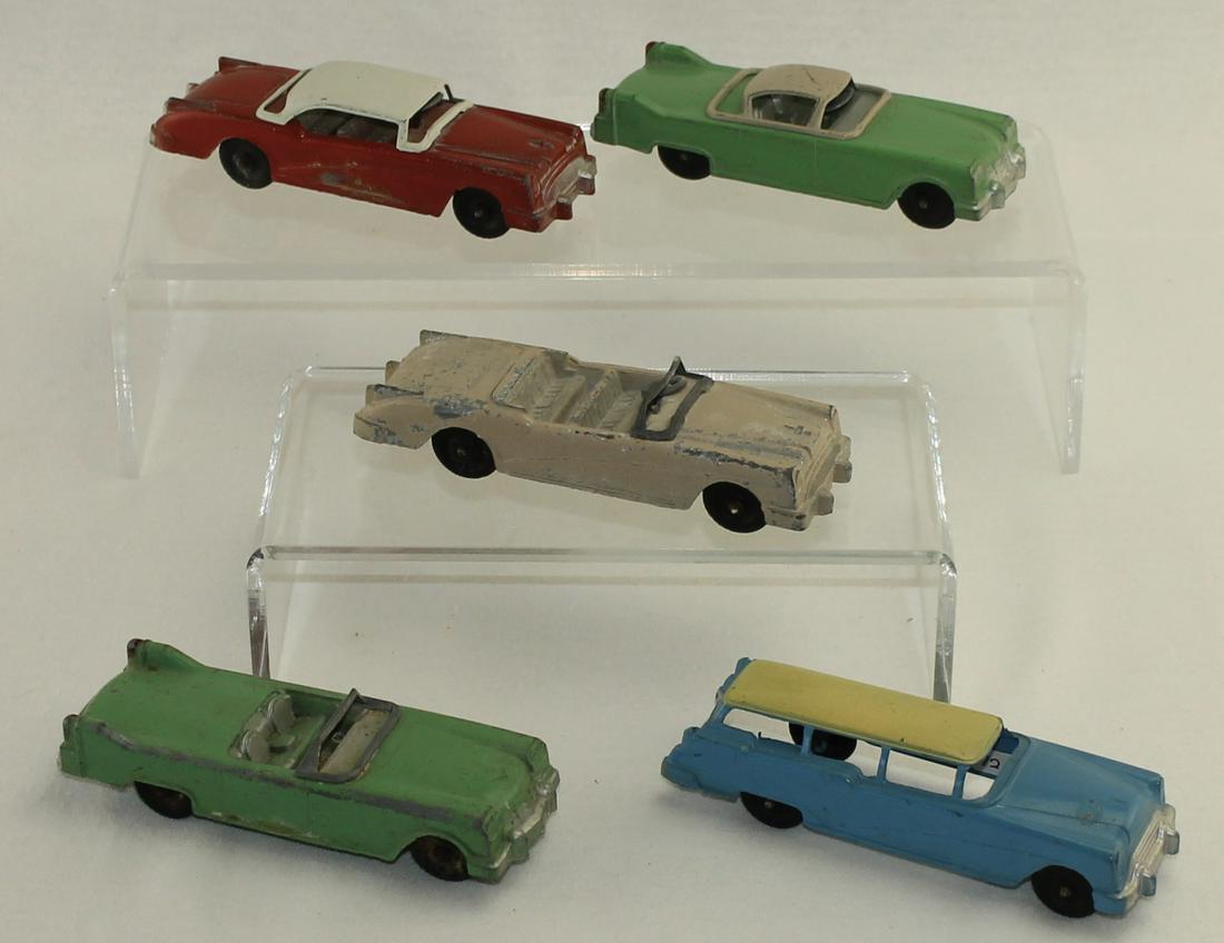 Manoil Lot Convertibles Ranch Wagon: Post War. Lot includes Manoil #716 Sedan, Manoil #717 Hard Top Convertible, Manoil #718 Convertible, Manoil #719 Sports Car and Manoil #720 Ranch Wagon. 5 Pieces. Condition Good to Very Good. No Box.
