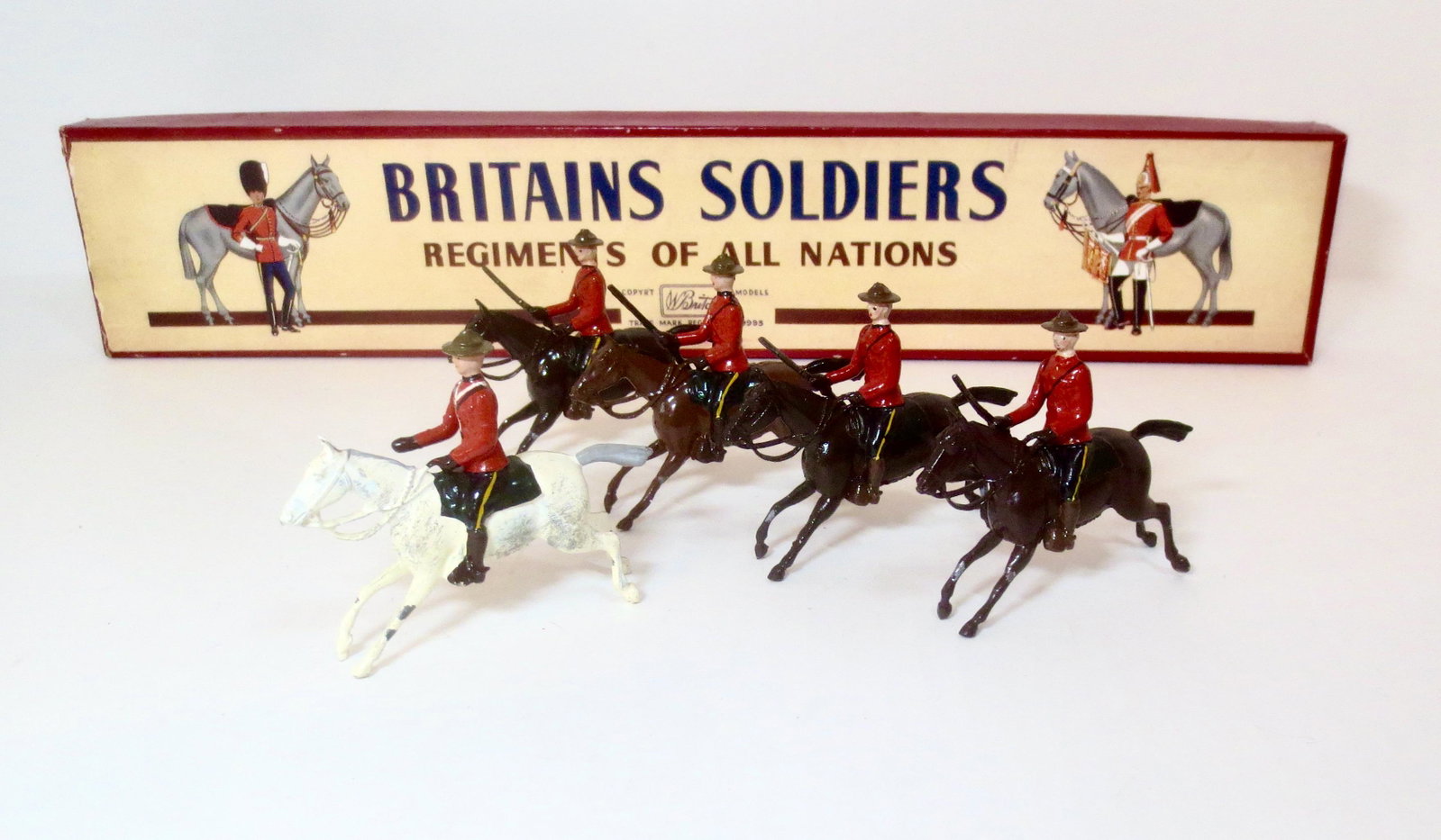 Britains #1349 The Royal Canadian Mounted Police: Post war issue. 5 pieces. Near mint to excellent condition. Box very good (missing tie card).