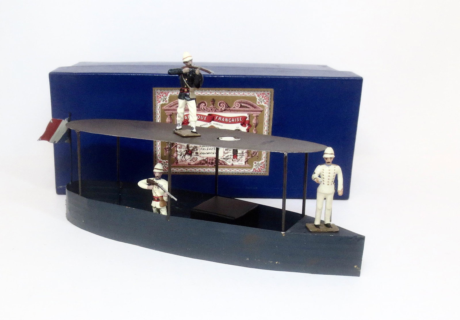 Mignot River Boat: 3 pieces. Excellent to fair condition (boat missing stove & pipe, officer's pistol broken loose). Box very good.