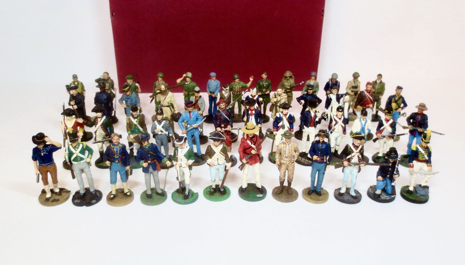 American Military Historical Society Set: Soldiers representing America's fighting men from 1780 - 1965. 50 pieces. Mint to near mint condition. Come with a non-labeled box in good condition.