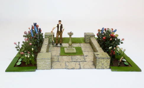 Britains Garden With Sundial & Flower Beds