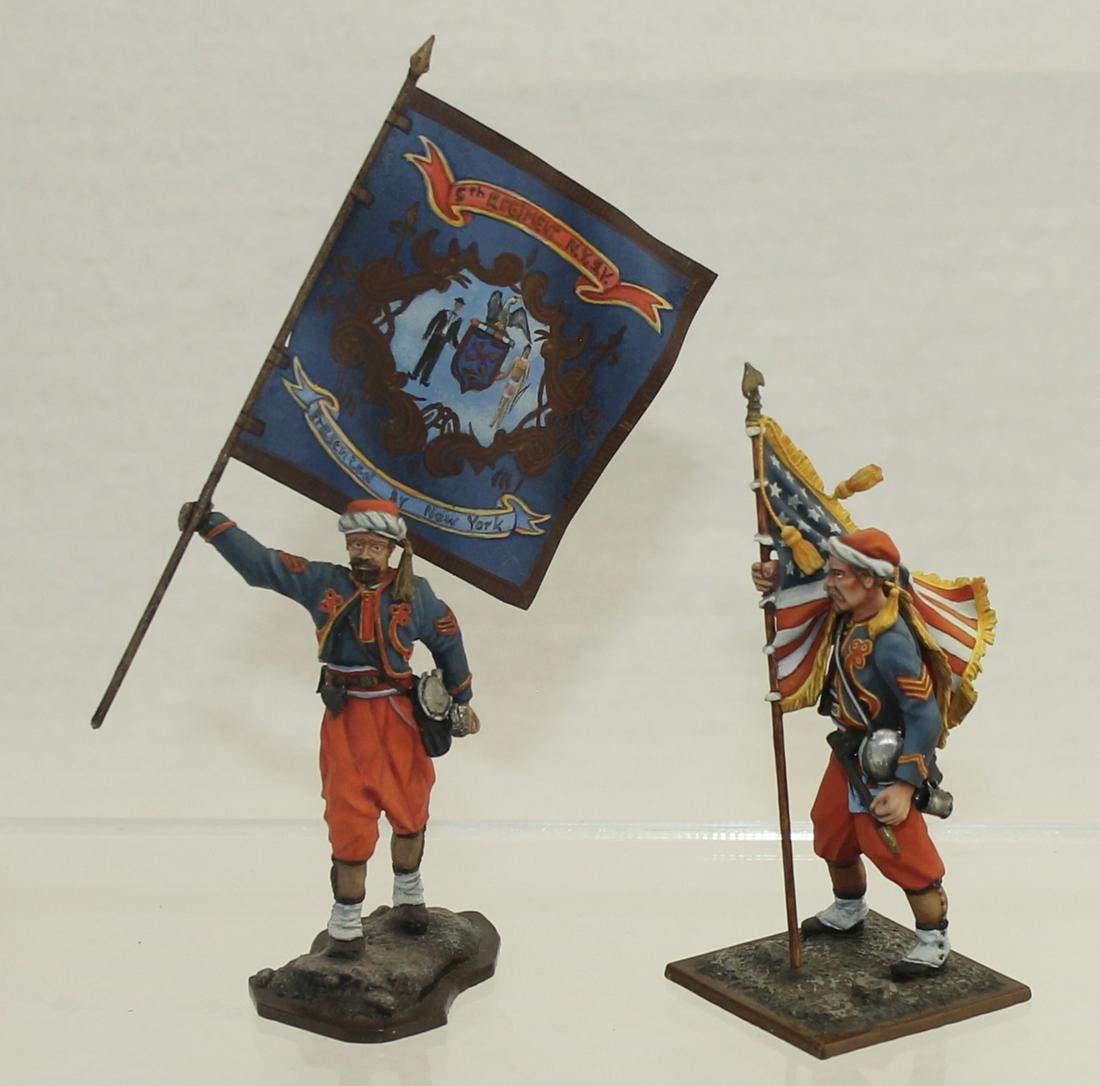 Romanenkov Studio 5th N Y Zouave Flag Bearers: American Civil War. 5th New York Zouave Flag Bearers. 2 Pieces. Condition Very Good to Excellent. One Flag Loose. No Box.