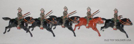 Britains RARE Non Catalogued US Cavalry: Britains Exceptionally Rare Un-numbered / Non Catalogued US Cavalry Based on the Boer and South African Mounted Infantry Set 38. 5 Pieces. All Light Khaki Uniform including Hat. 4 on Black Horses incl