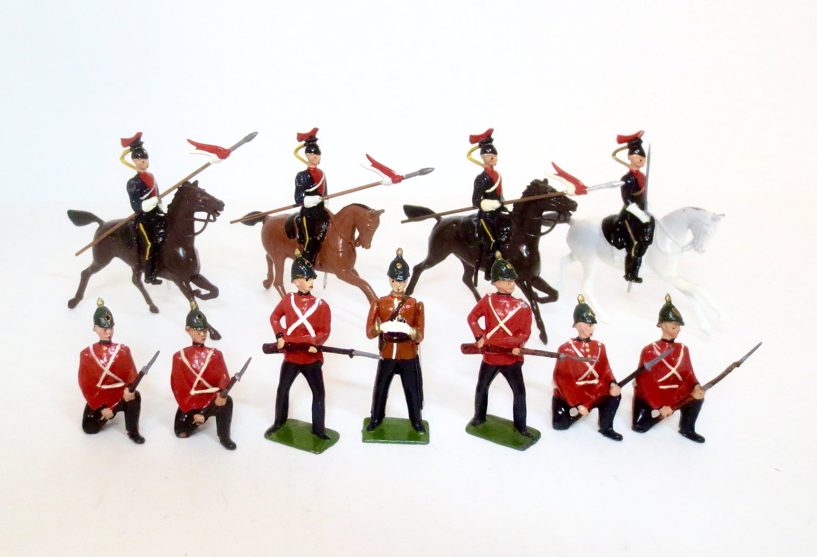 Britains #9143 Somerset Light Infantry: And #9217 17th Royal Lancers. Post war issue. 11 pieces. Near mint condition. Unboxed.