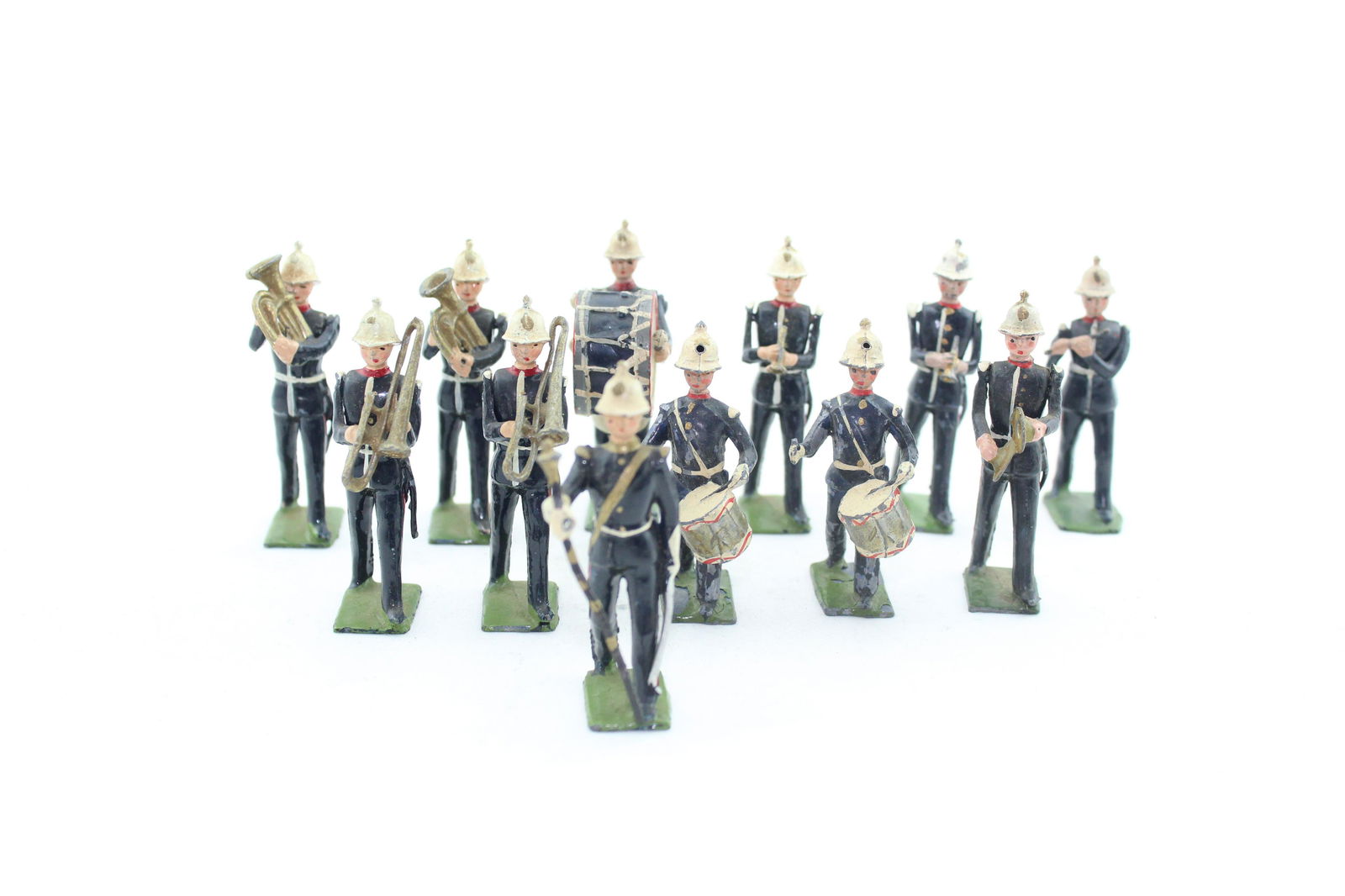 Britains Set #1291 Band of the Royal Marines: Twelve pcs, postwar with metal drums, VG, some helmets mismatched, two side drummers missing drumsticks. No box.