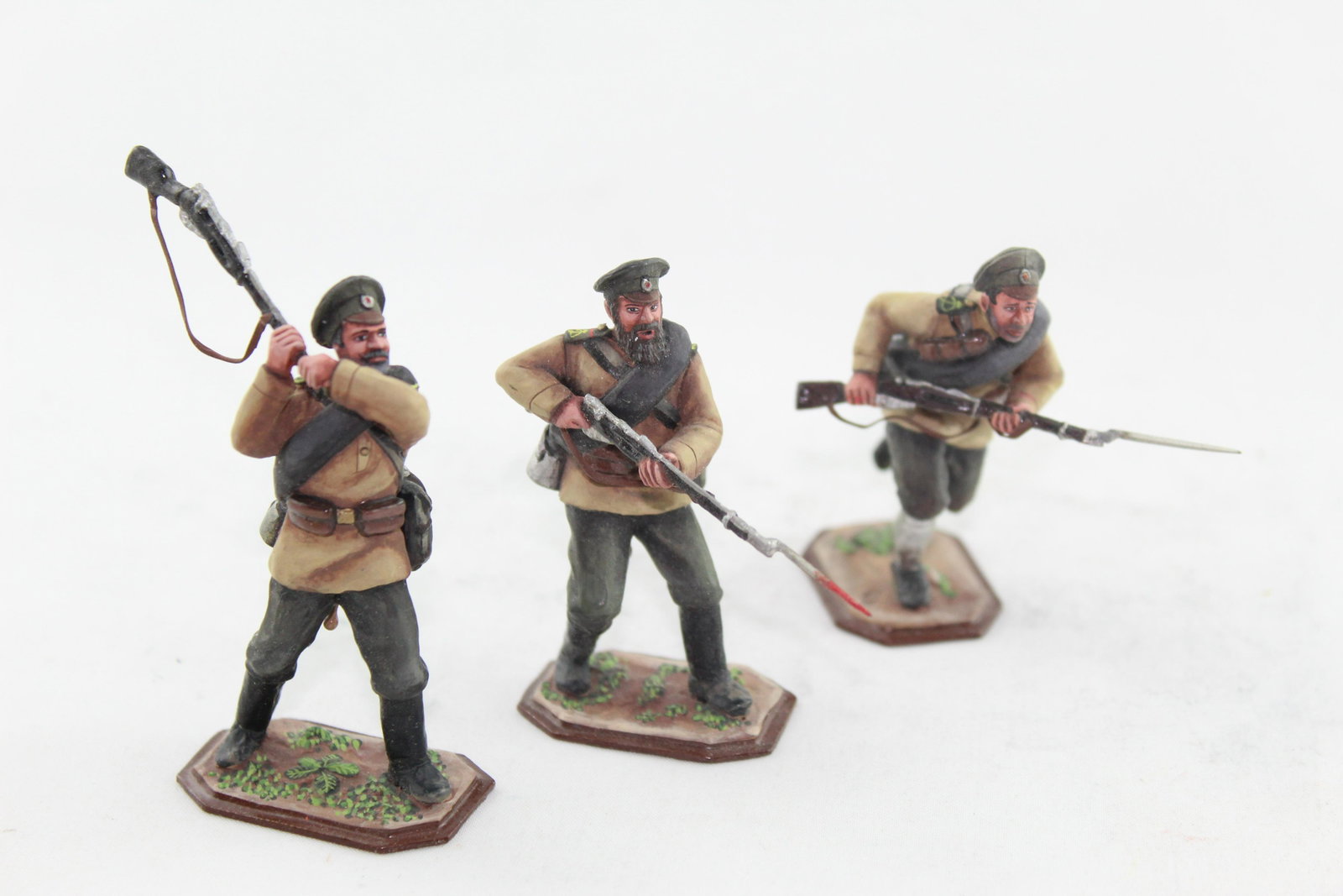 St. Petersburg Collection WWI Russians: Three pcs, 1996, 54 mm, #309.1, hard to find figures (62 of each produced), WWI White Russians in fighting poses, in peak caps, E/M. No boxes.