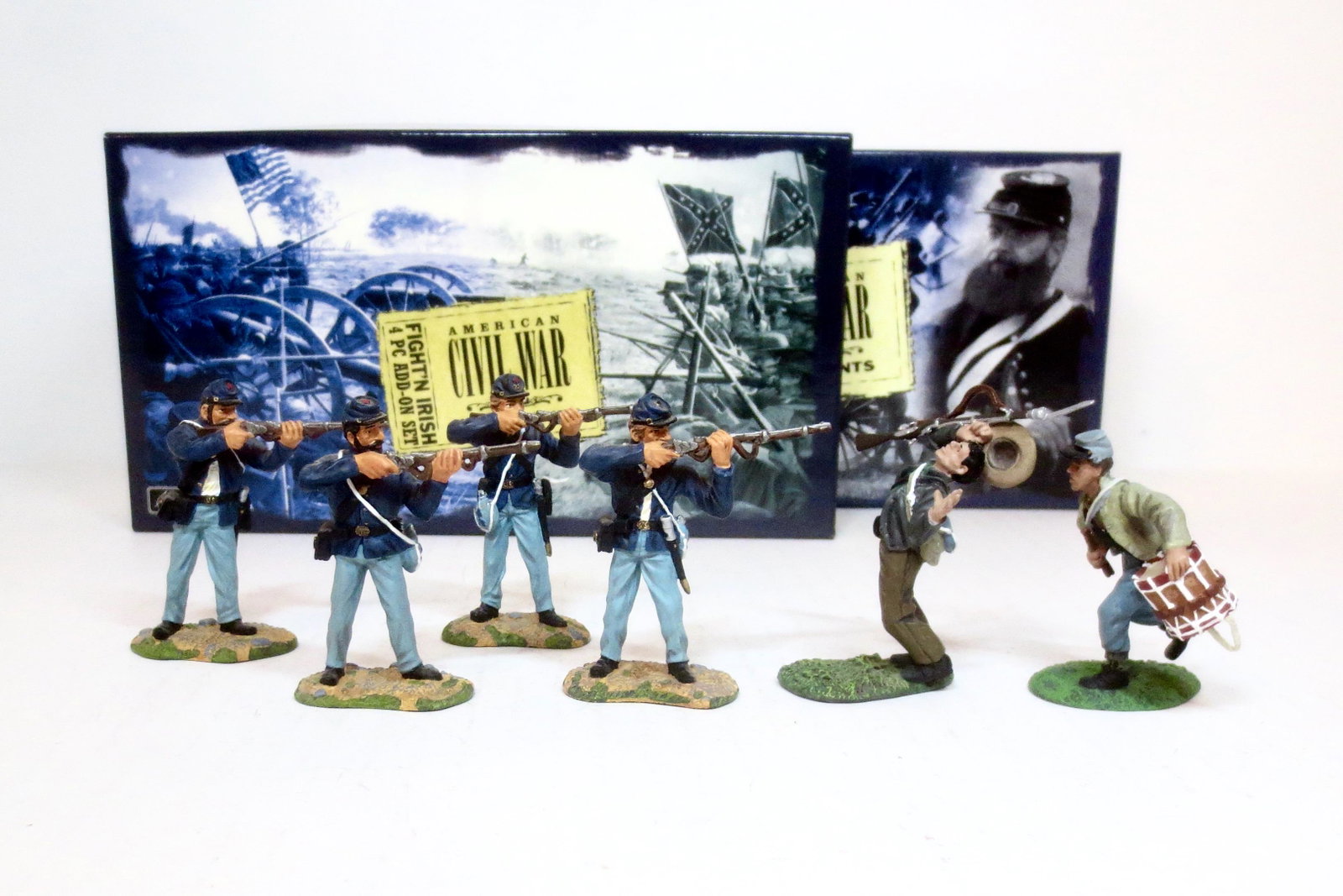 Britains #17109 Confederate Drummer & Wounded: And #17438 "Fight'n Irish". 6 pieces. Mint condition. Boxes Excellent.