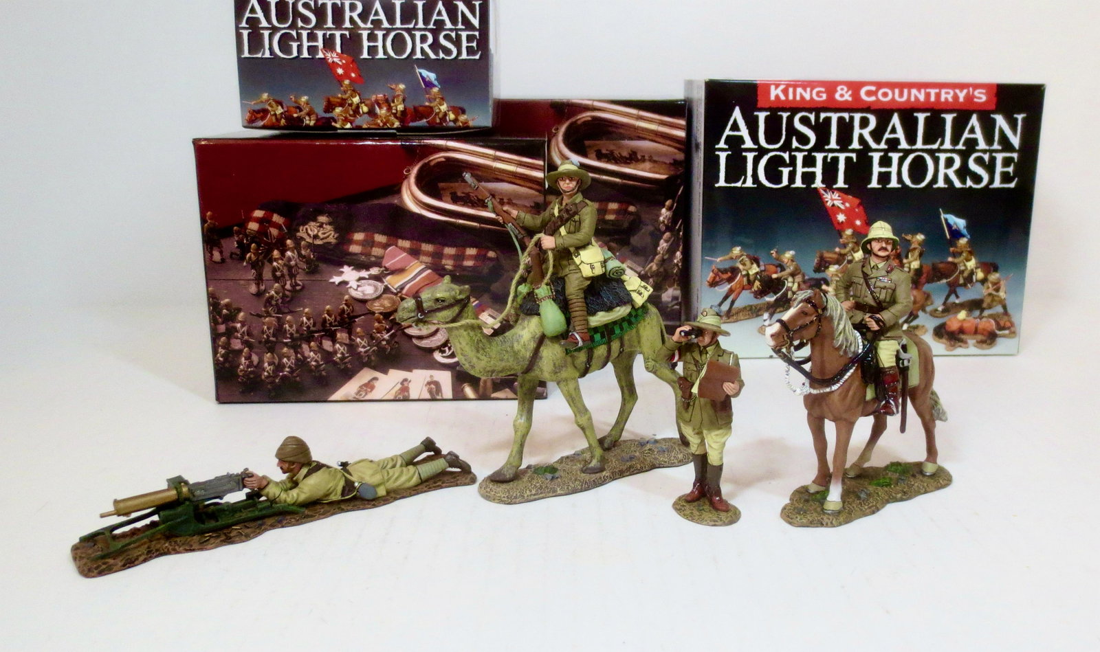 King & Country WWI Australian Light Horse Sets: Turkish Machine Gunner with Maxim #AL068. Australian Staff Officer Major Jack Haldane observing the Turkish defenses at Beersheba #AL027, Mounted Aussie on Camel with his Lee Enfield Rifle #AL037, and