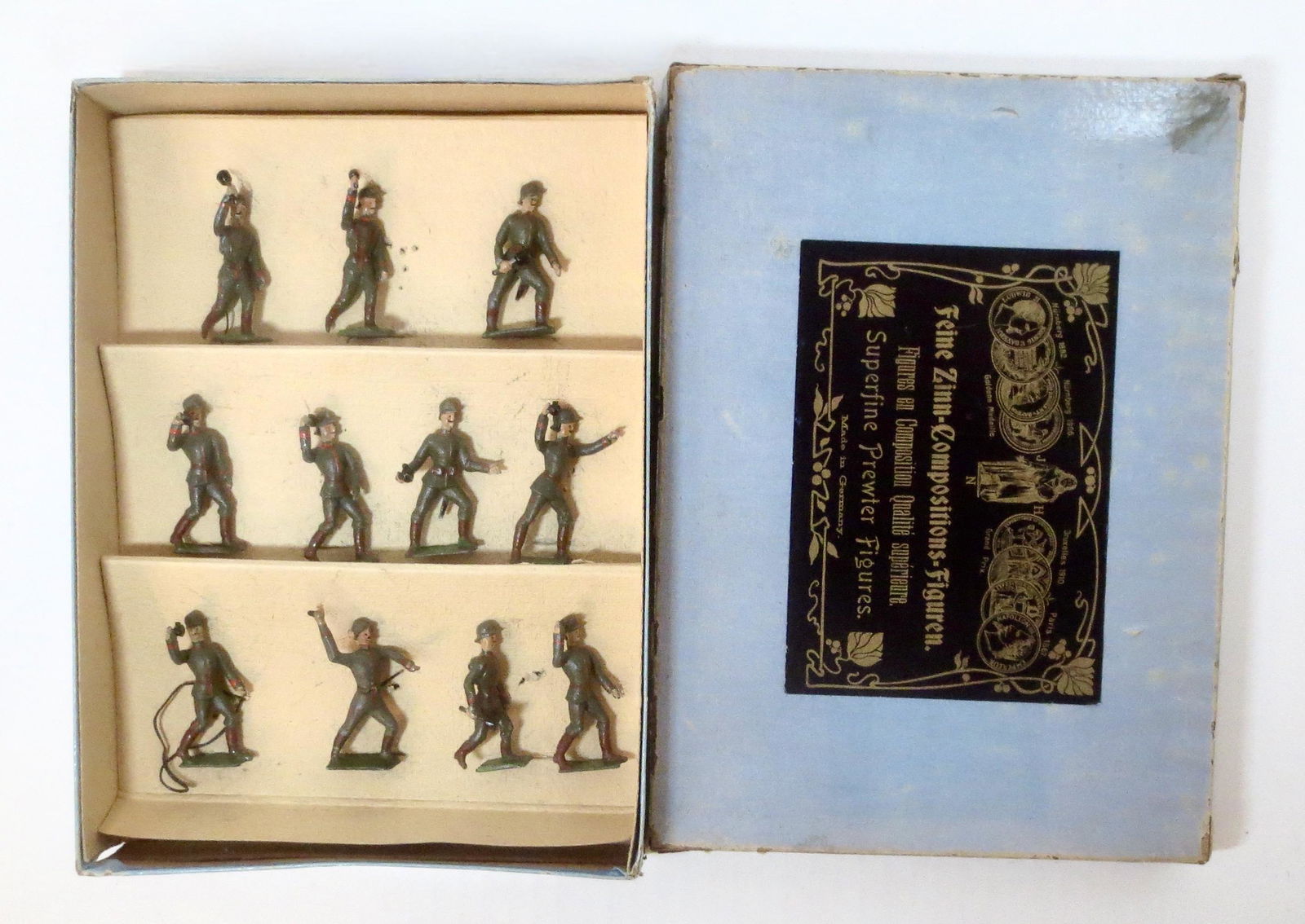 Heyde Germans Throwing Grenades: 11 pieces. Near mint to excellent condition. Box good (one top side split and repairs on corners)