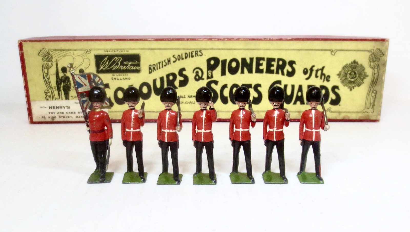 Britains #82 Colours & Pioneers: Of The Scots Guards. 7 pieces. Near mint to excellent condition (flag bearer mismatched paint). Box excellent.