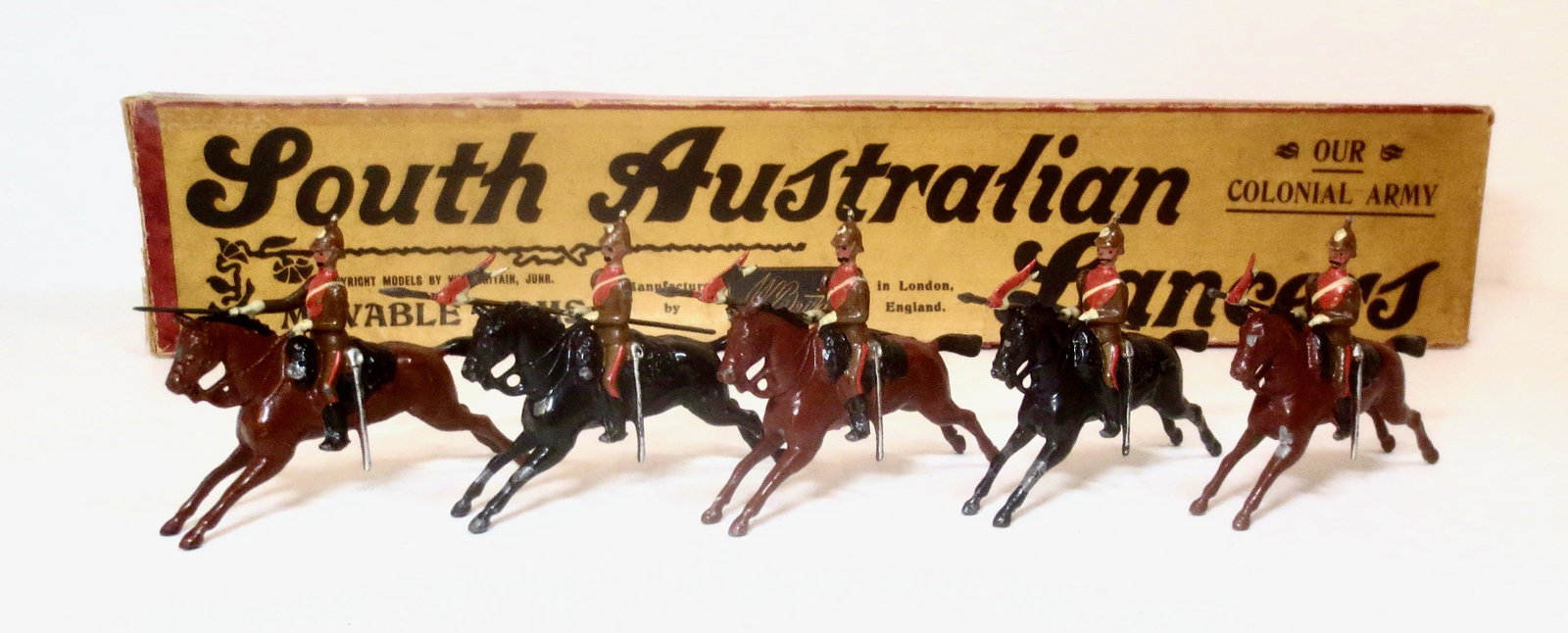 Britains #49 South Australian Lancers: Pre war issue. Tan Tunics. 5 pieces. Excellent condition. Box fair (taped repairs).