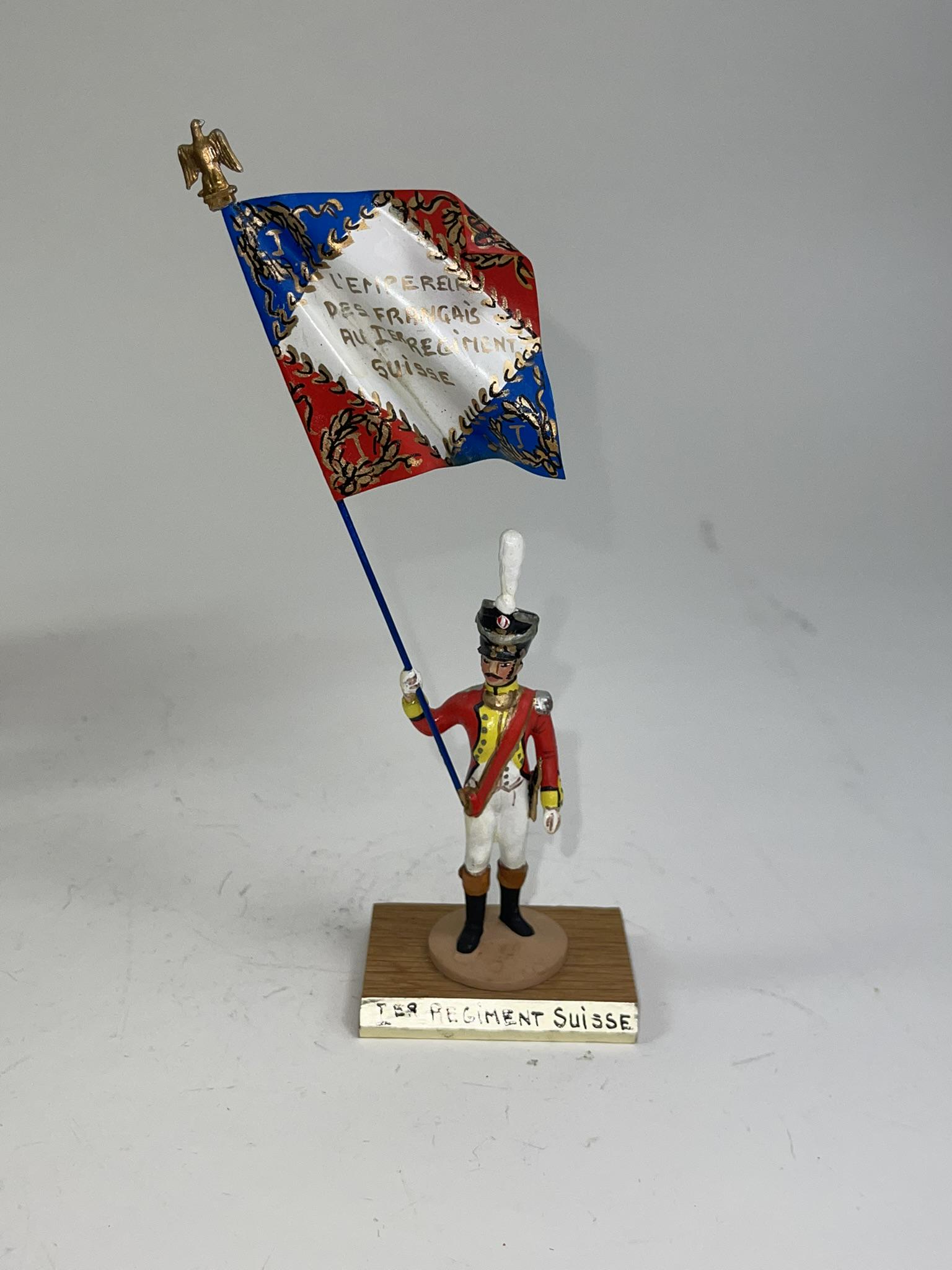 Auger Regiment Suisse Flag Bearer: 1 piece in excellent condition, mounted on wooden plinth.