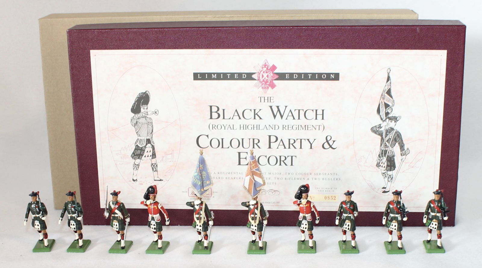 Britains Set 5297 Black Watch Color Party Escort: Limited Edition #852 of 2500. 10 Pieces. Condition Excellent to Mint. Officer's Baton Broken but Present. Box Excellent with Cardboard Outer Box.