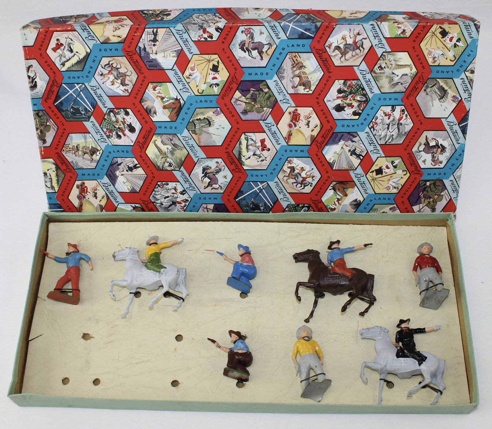 Britains Cowboys: Duofort Series. Second Grade. Cowboys From Set #65s. 8 Pieces. Condition Very Good. 2 Pistol Barrels Broken on Rifles. Box Very Good.