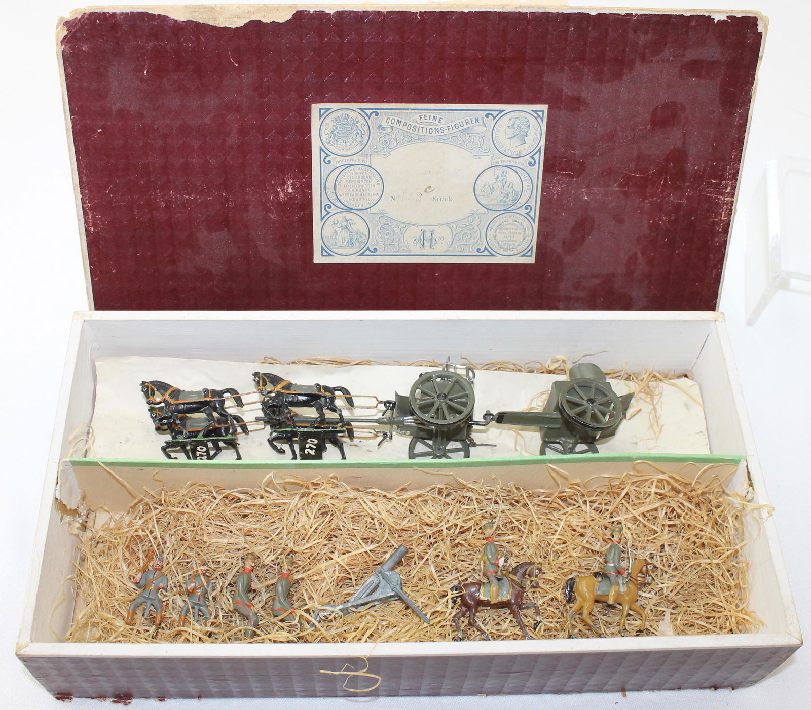 Heyde Lot German Army Machine Gun Carriage: Size 2 (48mm). Lot includes German Army 4 Horse Machine Gun Carriage with Riders. Includes Drivers, Machine Gun, Officer and Bugler on Horseback. Contained in Incorrect Box for Heyde Artillery Set. 10