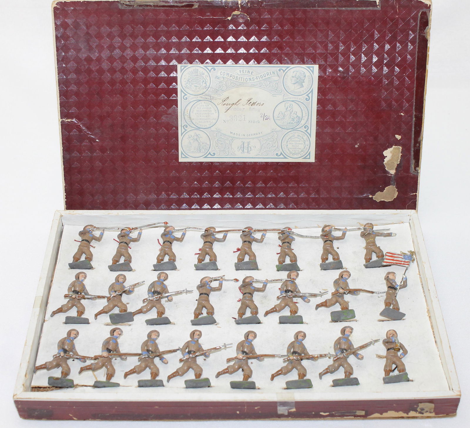 Heyde Set 3321 American Rough Riders: Size 2 (48mm). Spanish American War. Set Includes Officer with Sword, Flag Bearer, Bugler, Troopers Standing Firing and Advancing with Rifles. 24 Pieces. Condition Good to Very Good. One Bayonet Missi