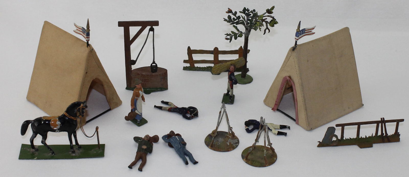 Heyde Lot American Continental Camp: Size 2 (48mm). American Revolutionary War. Lot includes 3 Men Lying Down, Man Carrying Straw, Woman with Pitcher, Tethered Horse, Water Well, 2 Cloth Tents with American Flags, 2 Rifle Stacks and 3 Sc