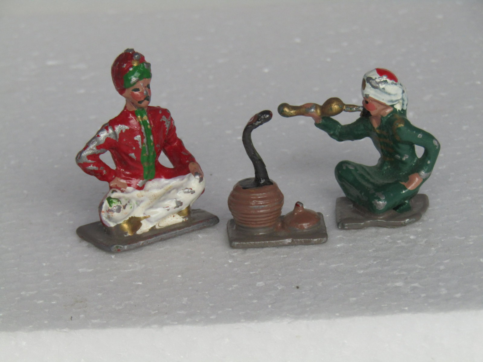 Circus Snake Charmers: Circus snake charmers in turbans with snake. 54 mm solid metal. Condition Good.