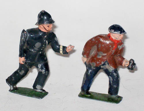 Pixyland Burglar and Policeman with Truncheon.: Pixyland VERY RARE Burglar and Policeman with Truncheon. Circa 1930. Two Pieces, 60 mm scale.