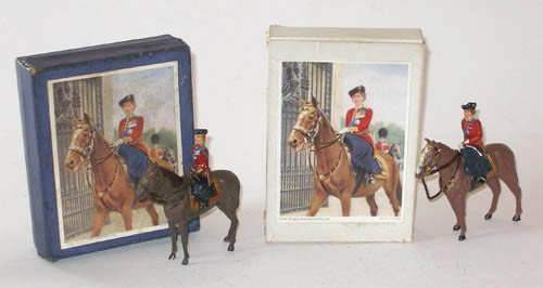 Timpo Trooping the Colour. HM the Queen Mounted: Timpo Trooping the Colour. HM the Queen Mounted on Winston removable from Horse & a Similar Example by Nobel, Fixed to Horse. Both in Original Illustrated Boxes.