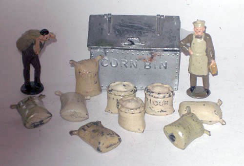 John Hill/ Johillco Miller, Millers Laborer, etc.: John Hill/ Johillco Miller, Millers Laborer, Corn Bin and Sacks of Corn, Open and Closed. Pre War. 12 Pieces.
