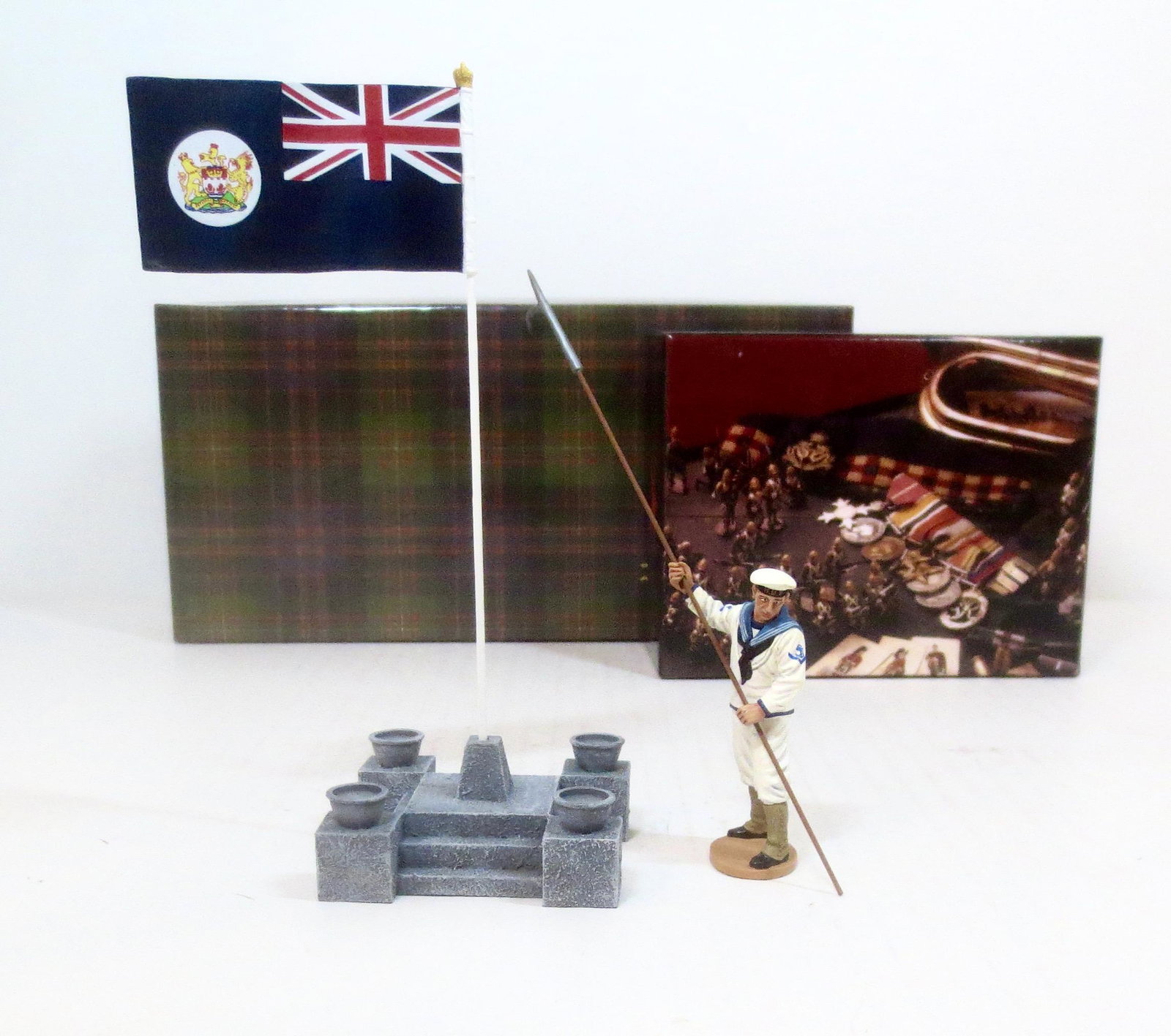King & Country #CHK010 Ceremonial Flag Base: And, #GA033 Gallipoli Royal Navy Sailor. 3 pieces. Mint condition. Boxes excellent.
