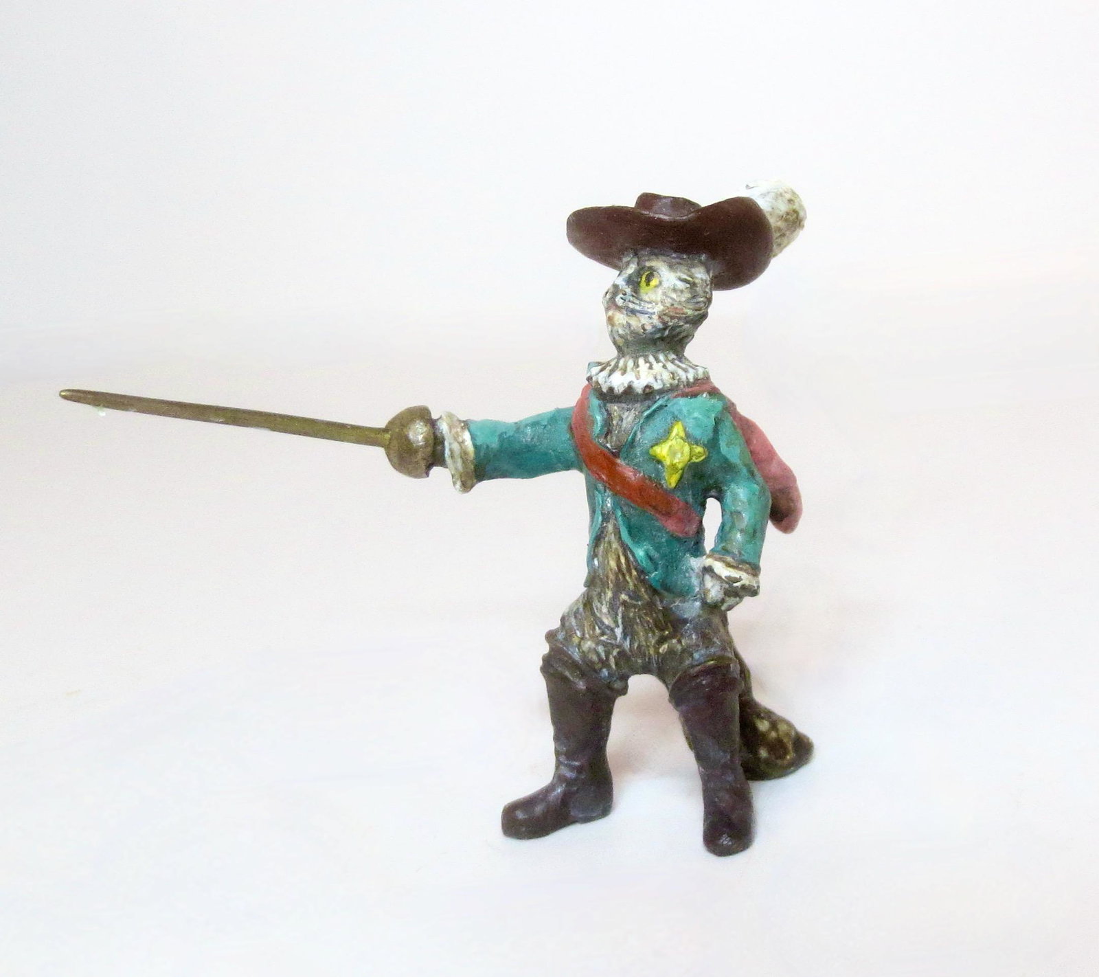 Vienna Bronze Puss in Boots: Wonderful bronze depiction of Puss in Boots with drawn sword, based on the Italian Fairy Tale and later Grimm's Fairy Tale. 60mm tall. Excellent condition. No box.