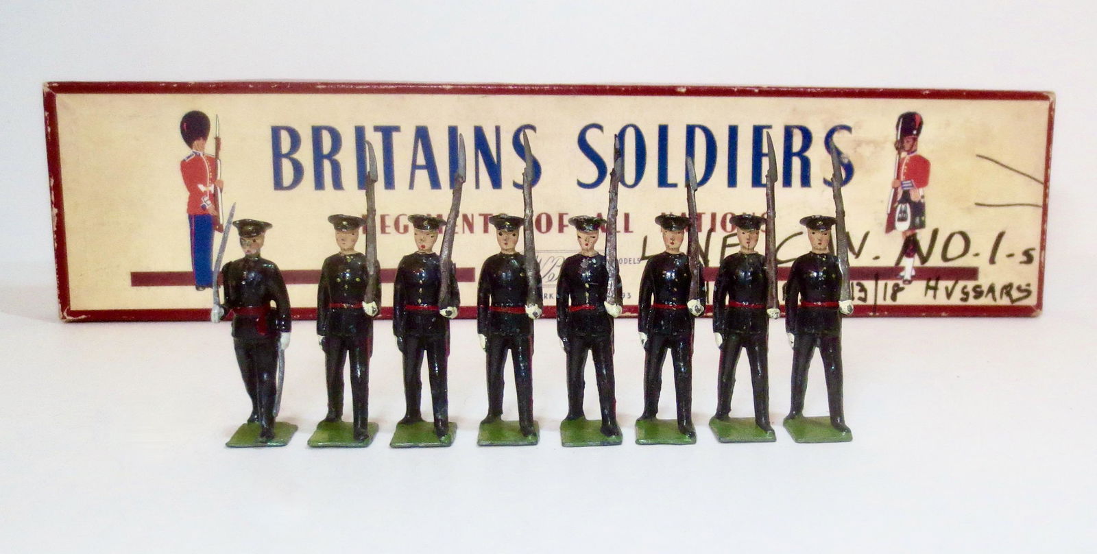 Britains #2089 Gloucestershire Regiment: Post war issue. 8 pieces. Excellent to very good condition. Box bottom in good condition with tie card, top poor with ink writing on top.