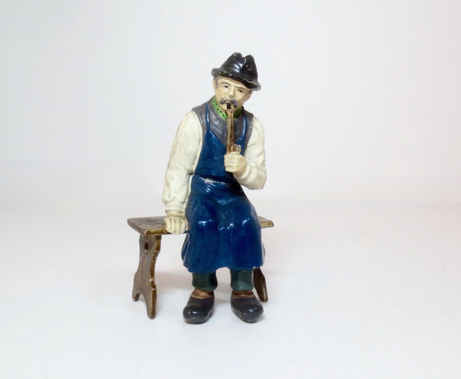 Large Scale Man on Bench Smoking Pipe (1 of 2)