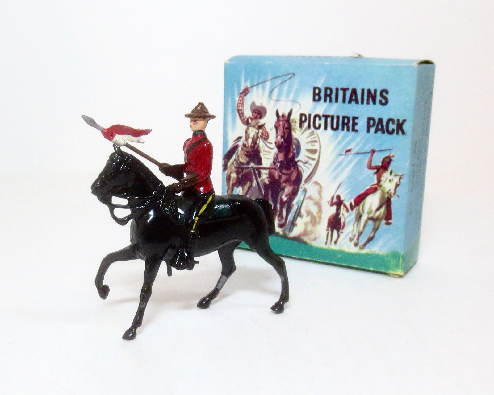 Britains #1373B Royal Canadian Mounted Police: In regulation dress with lance. Scarce picture pack. Near mint condition. Box very good (small puncture on one end).