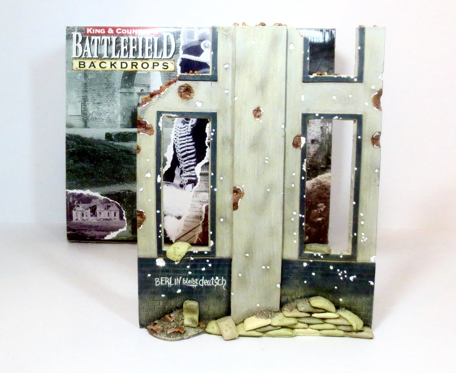King & Country #SP16 Reich Chancellery Annex: Retired. Two Reich Chancellery windows stand forlornly open, framed by a battle scarred outer wall. 10.5" tall. Can be used to flank the chancellery gate or on it's own. Mint condition. Box excellent.