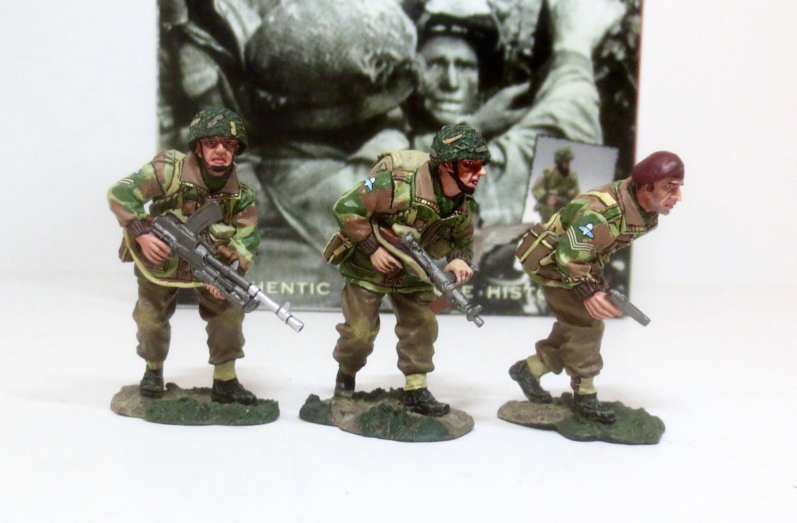 King & Country #MG015 Advance to Contact: Three airborne men edge cautiously forward. Glider Pilot Sergeant Chris Hopwood, Corporal Pete Foster with the Bren gun and Private Eric Stanley clutching his Sten. Retired. 3 pieces. Mint condition.