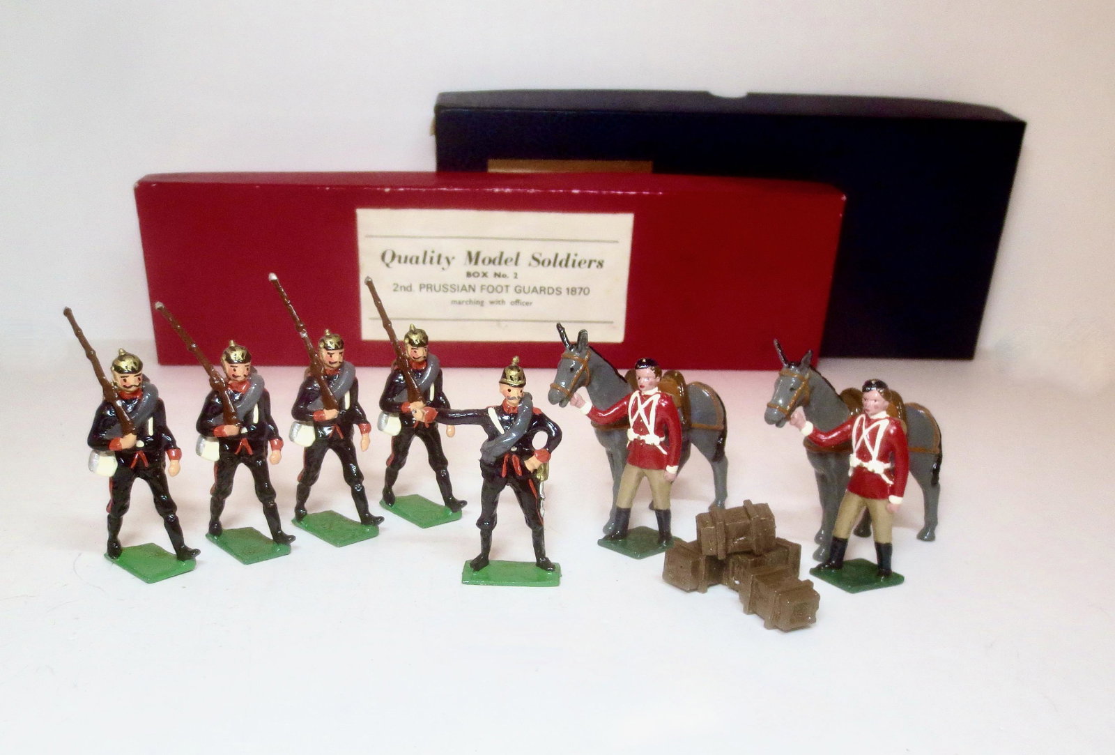 Blenheim #E2 Ammunition Mules & Handlers: And, Quality Model Soldiers 2nd Prussian Foot Guards Marching. 13 pieces. Mint to near mint condition. Boxes very good.