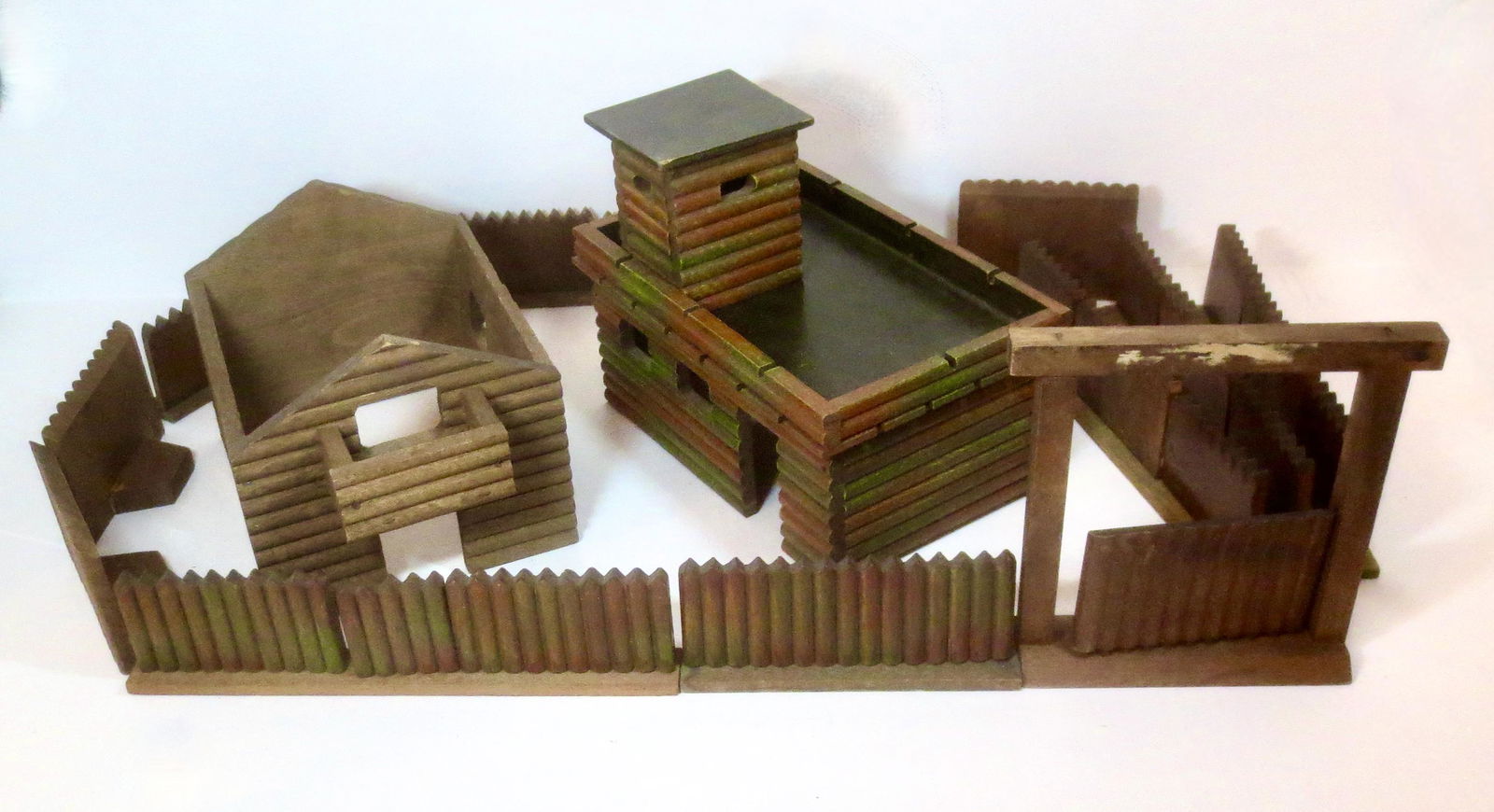 Wooden Stockade Fences, Gate, Fort & Cabin: 5.25" to 7" tall. 14 pieces. Excellent condition (cabin missing roof). Unboxed. **Additional Shipping Due to Large Lot Size**