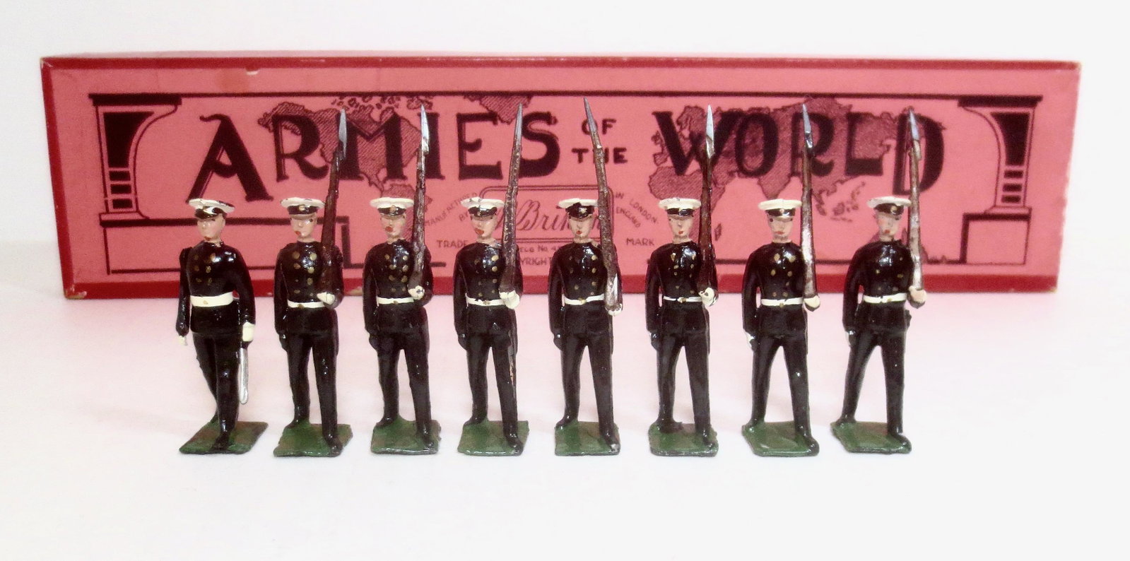 Britains #1835 Argentine Naval Cadets: Circa 1939-1949. 8 pieces. Near mint to excellent condition. Box excellent.