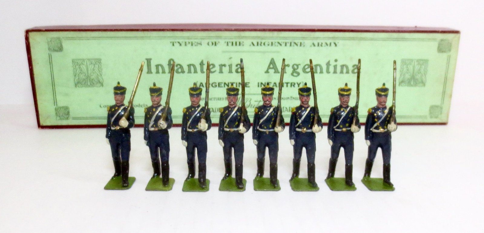 Britains #216 Infanteria Argentina: Pre war issue. 8 pieces. Mint to near mint condition. Printers box in good condition (missing tie card).