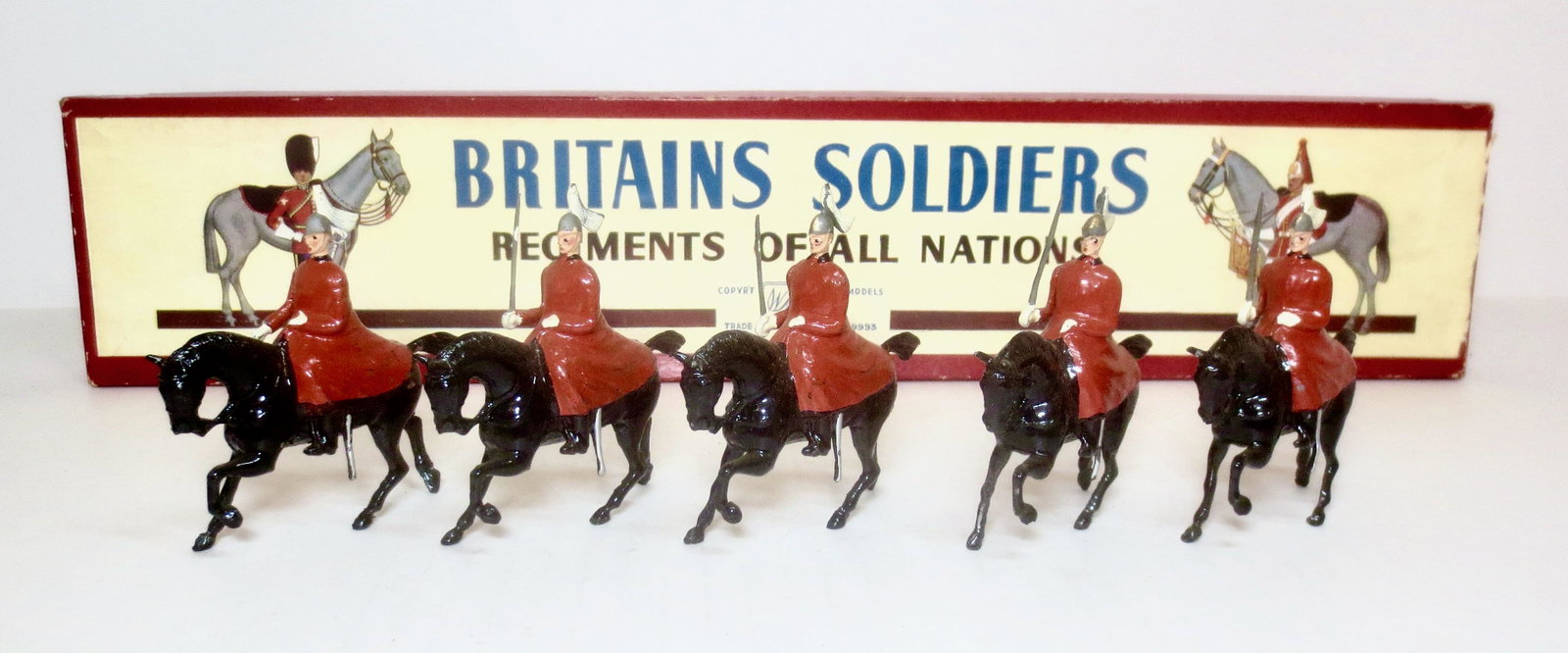 Britains #400 The Life Guards: Post war issue. Mounted in Winter Cloaks. 5 pieces. Near mint to excellent condition. Box good (missing tie card).